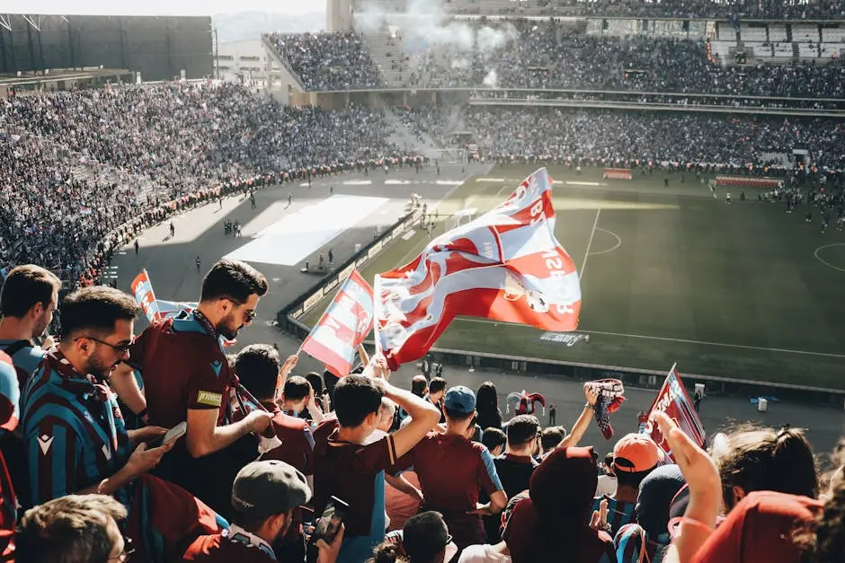 جمهور كرة قدم بأعلام داخل ملعب يعكس غياب فرق الدوري المصري من EA Sports FC 26