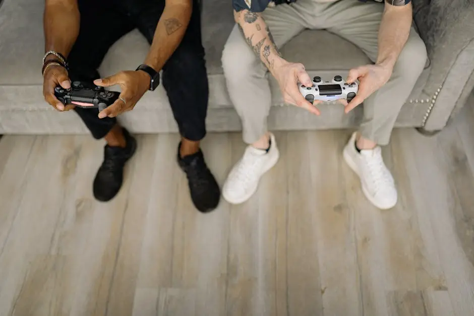 صديقان يلعبان بأذرع التحكم لعبة تعاونية ضمن ألعاب ps plus يونيو 2026